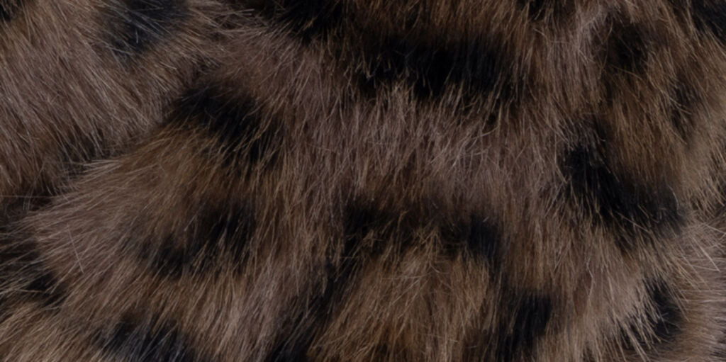 KATE FAKE FUR CROSSED SLIDE