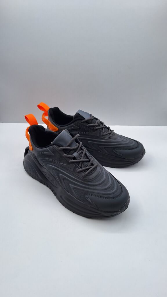 Black Textured Sneakers with Orange Accents