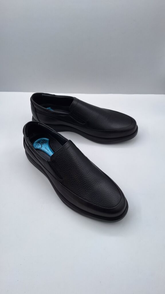 Black Textured Slip-On Shoes with Cushioned Comfort