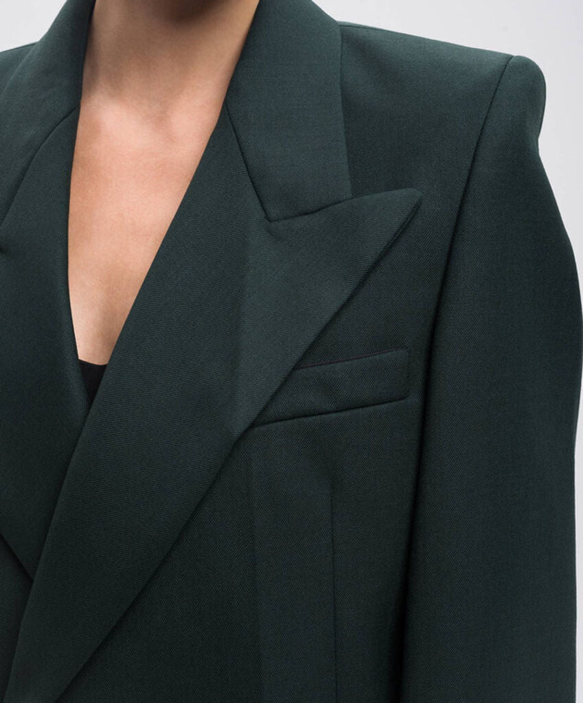 Dark Jacket with Bold Lapels and Gold Chain Detail