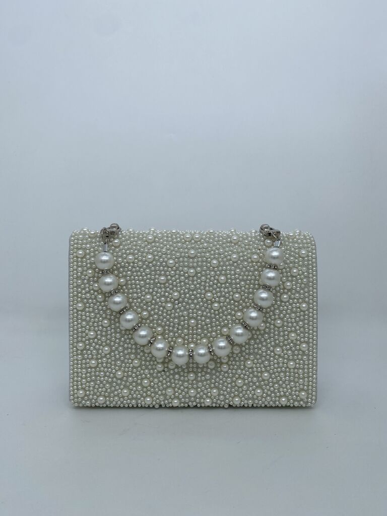 Ivory Pearlescent Clutch with Textured Design