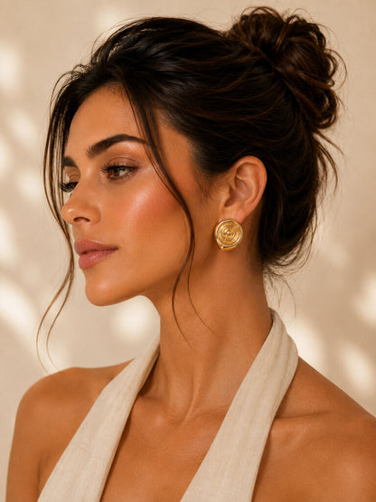 gold spiral shell clip earrings