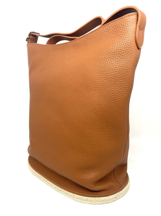 Tan Textured Bucket Bag with Adjustable Strap
