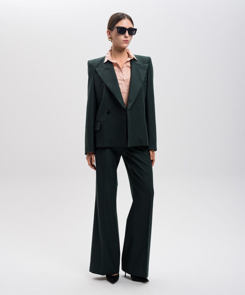 Dark Jacket with Bold Lapels and Gold Chain Detail