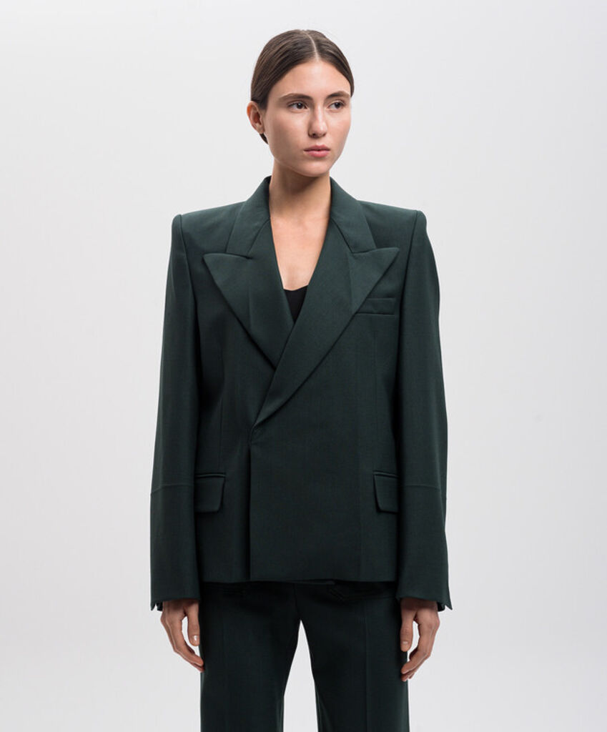 Dark Jacket with Bold Lapels and Gold Chain Detail