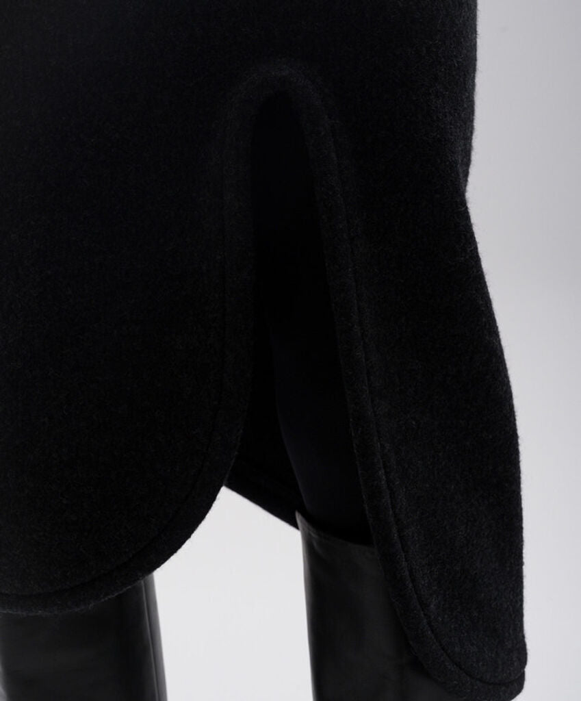 Elegant Black Knit Midi Skirt with Unique Cut