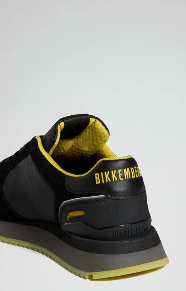Black Textured Sneakers with Yellow Accents