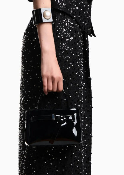 Black Structured Handbag with Unique Buckle