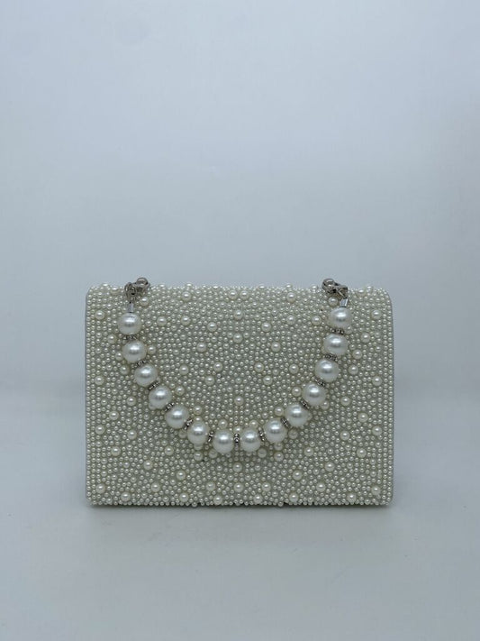 Ivory Pearlescent Clutch with Textured Design