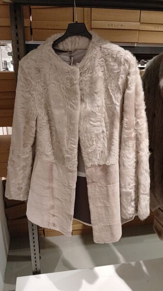 Cream Textured Coat with Elegant Detailing